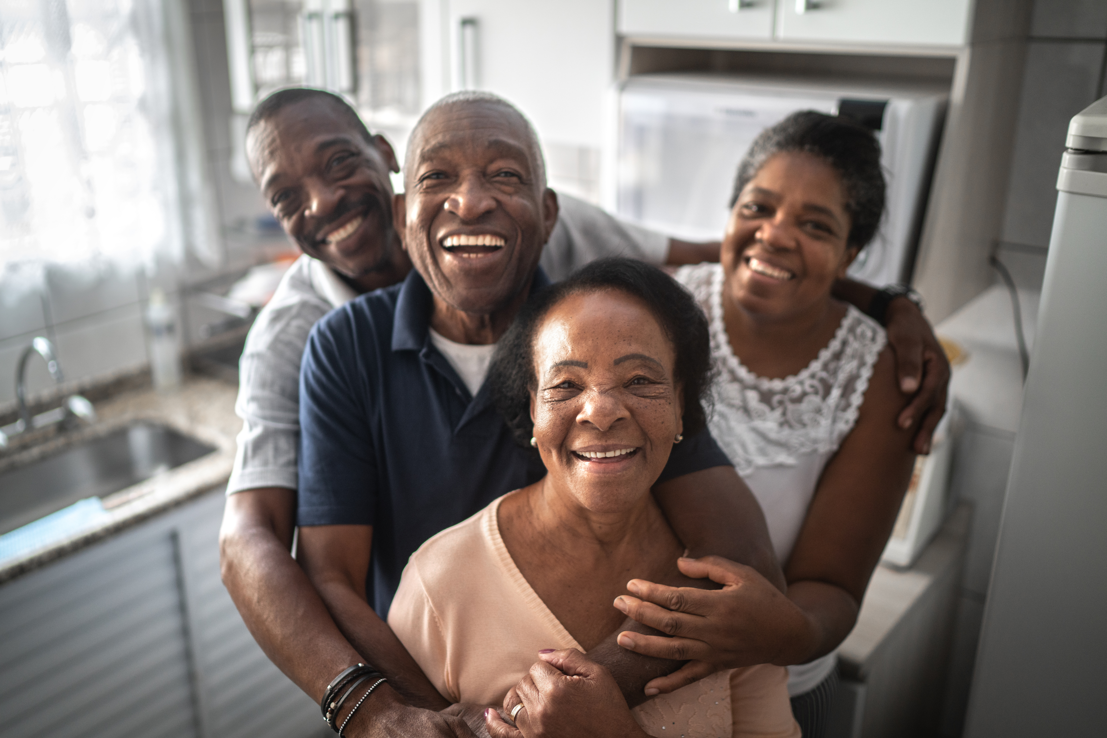 Group of older people embracing