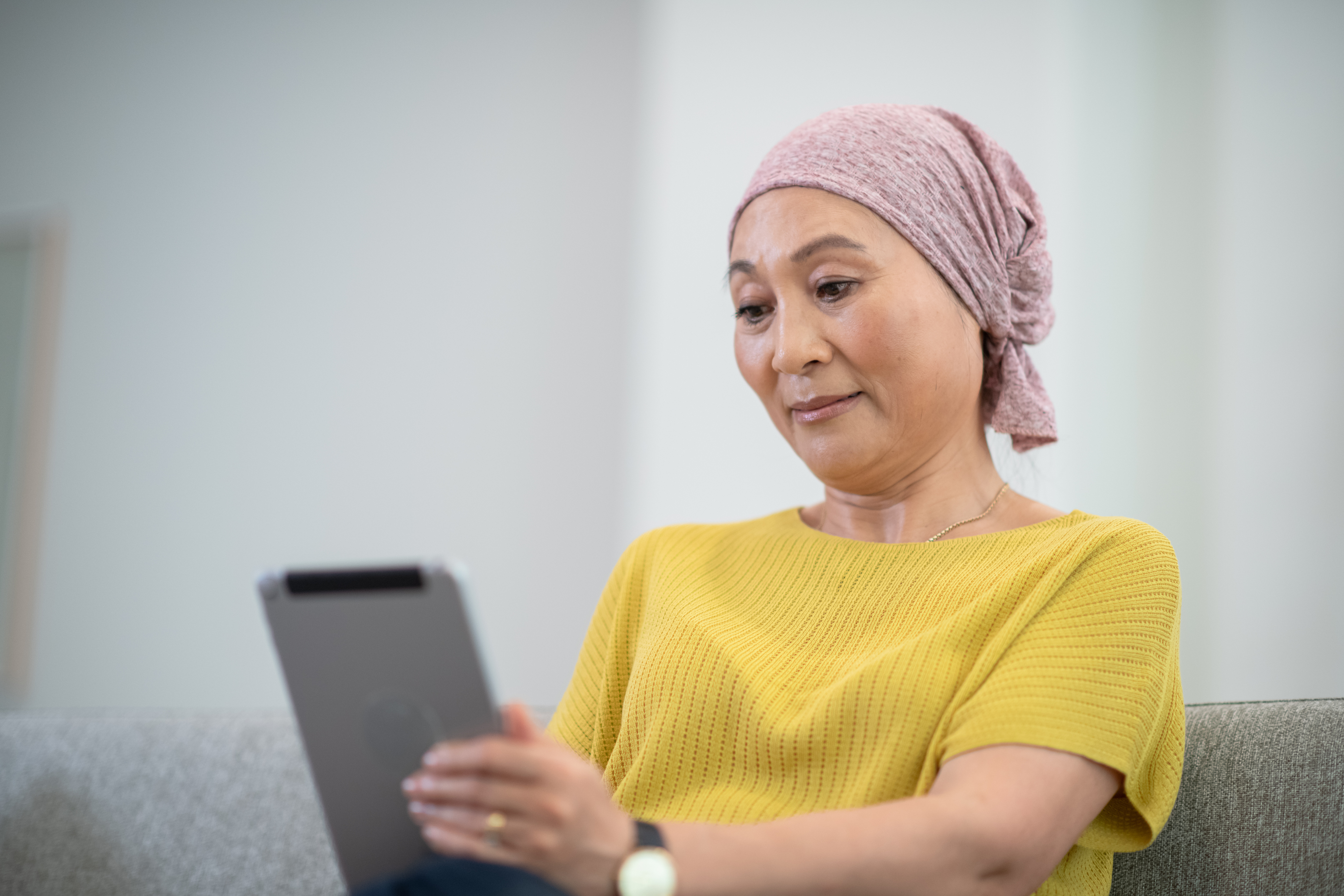 Woman reading tablet