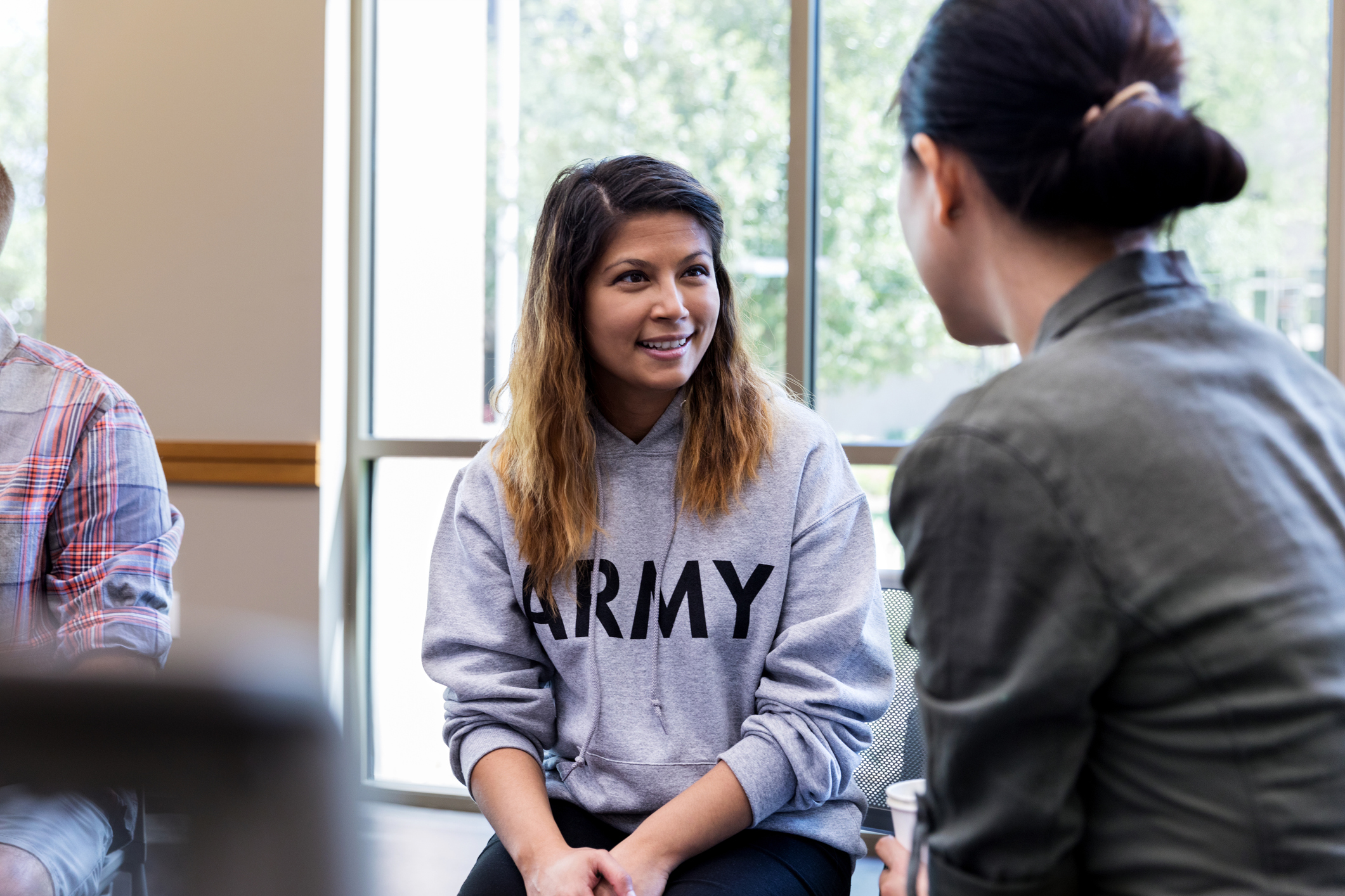 Army Veteran Woman talking with friend