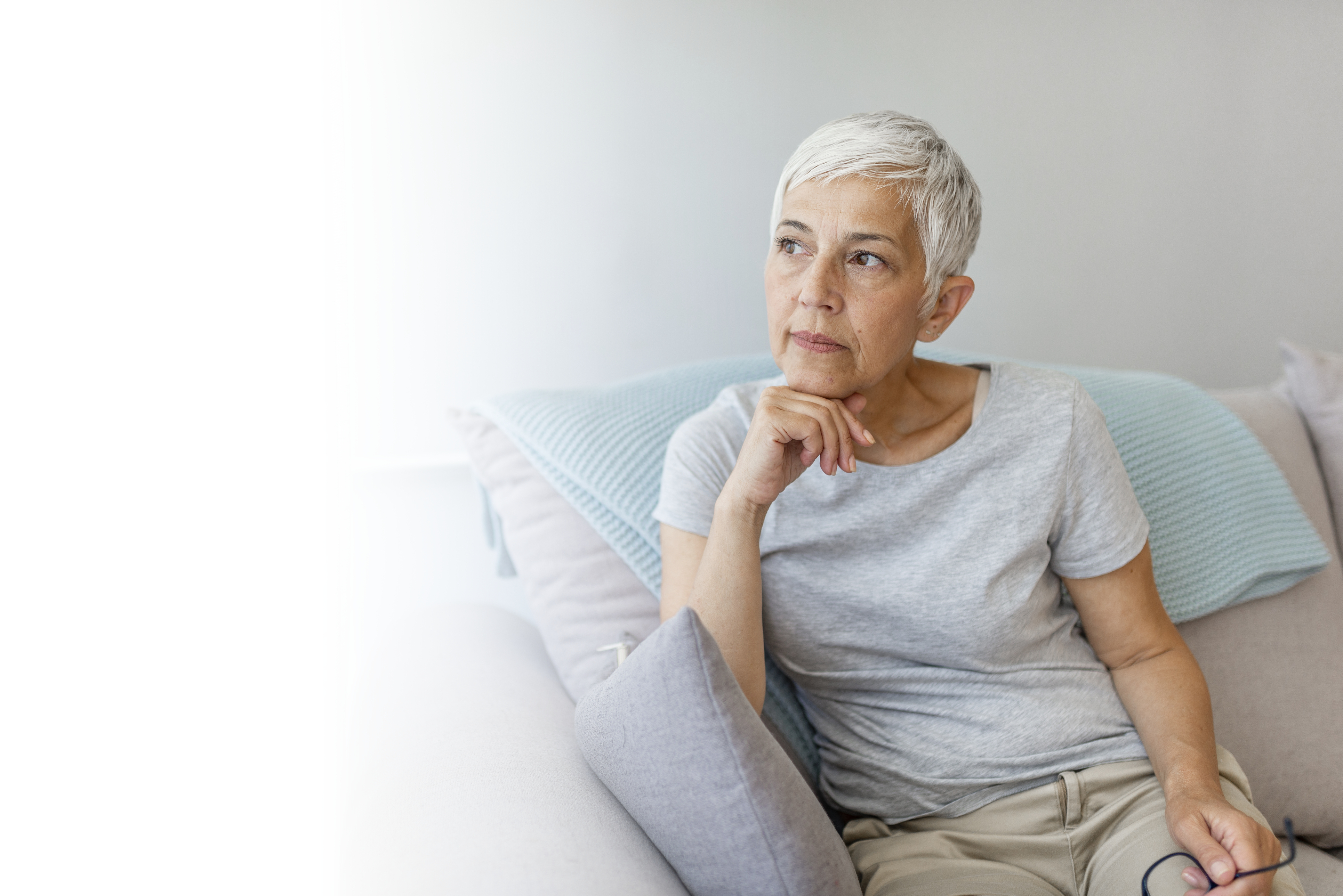 Woman looking pensively into the distance