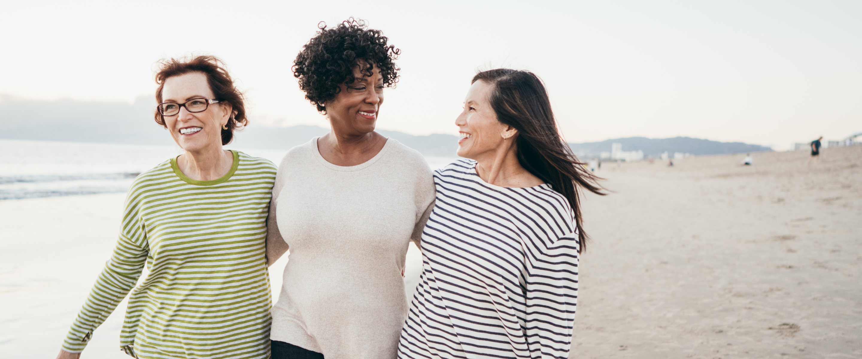 Women walking on a beach