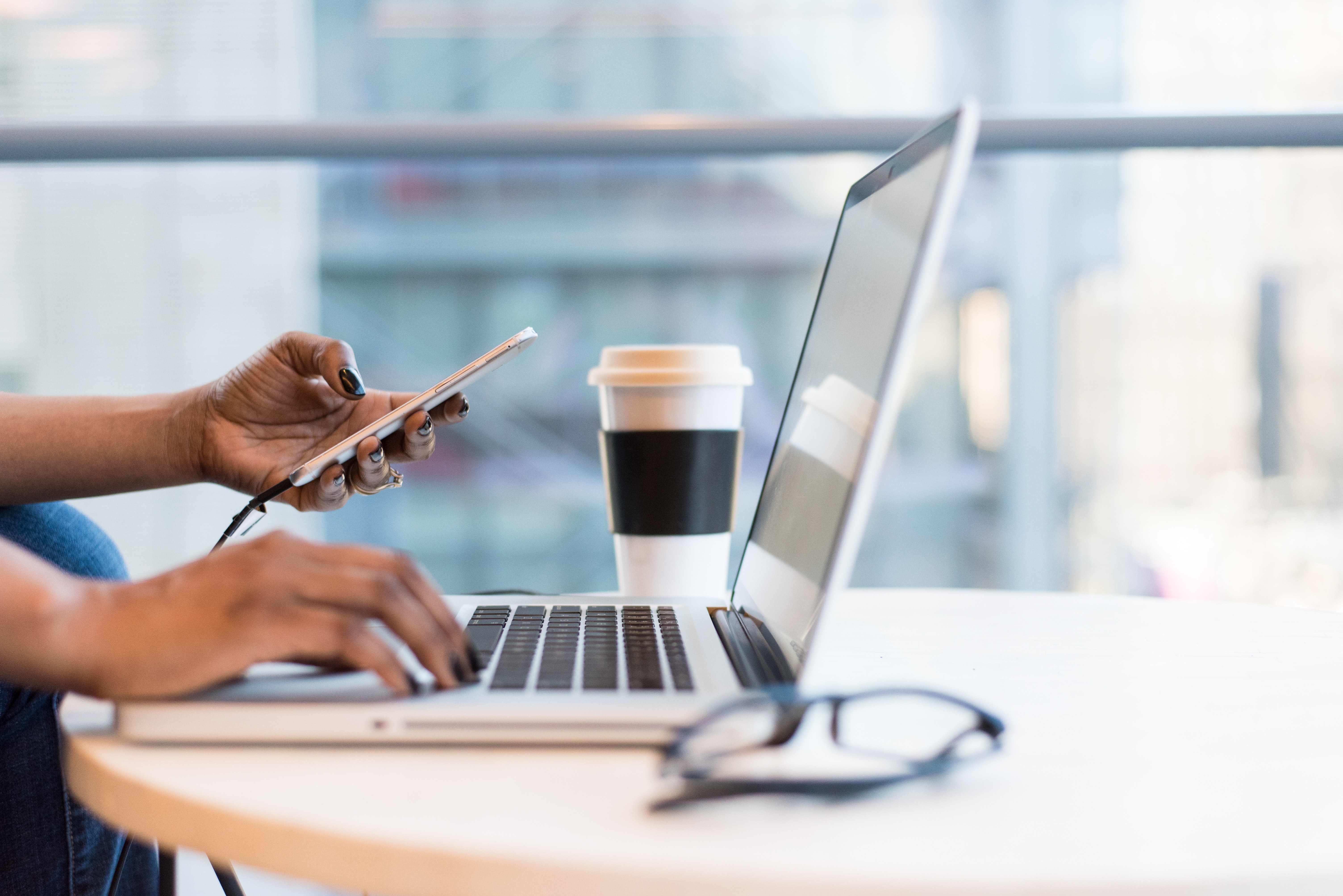 Person checking email at laptop